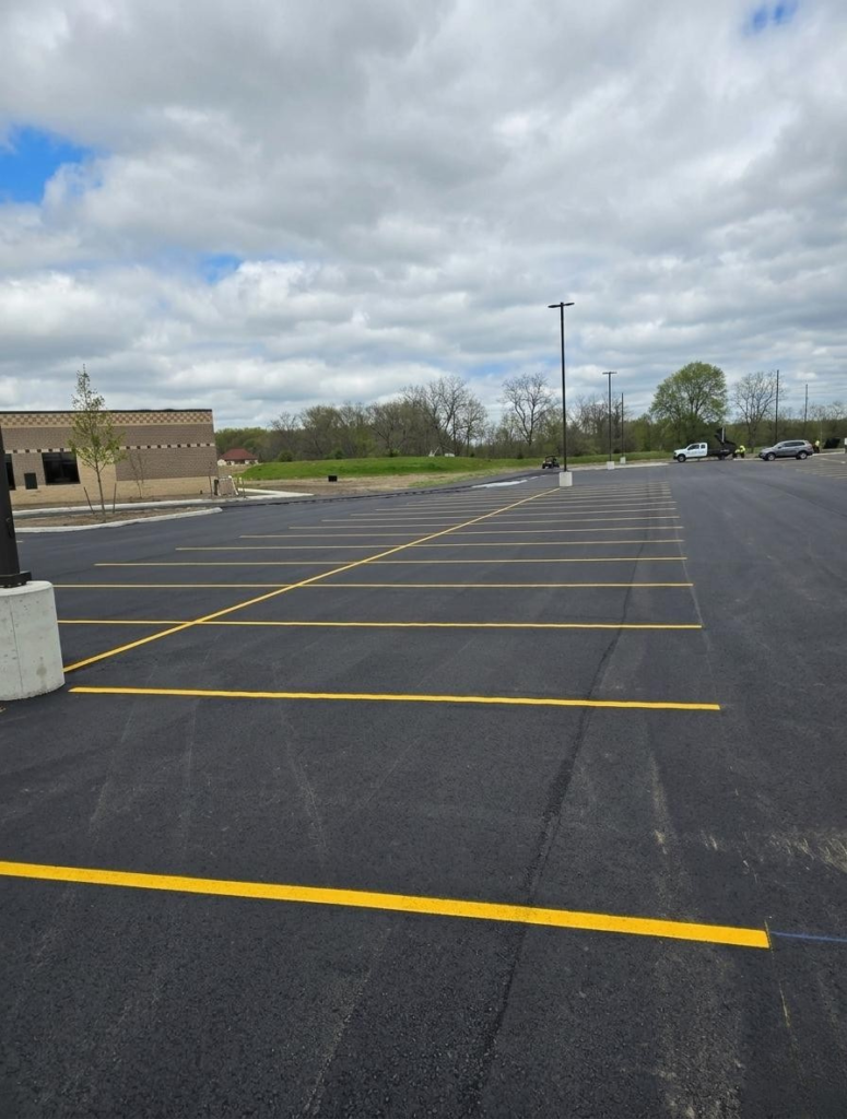fresh parking lot striping on new asphalt in Colorado Springs